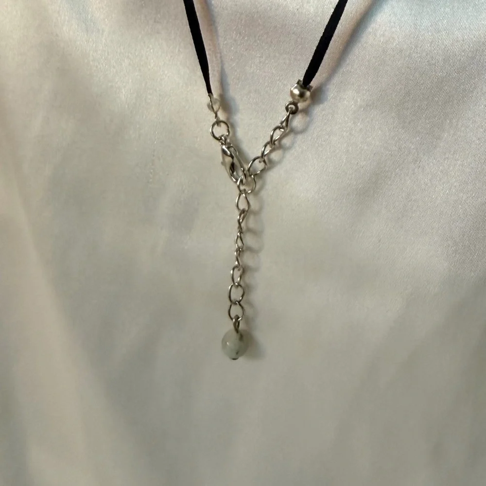Elegant Silver and Black Necklace with an earthy colored bead